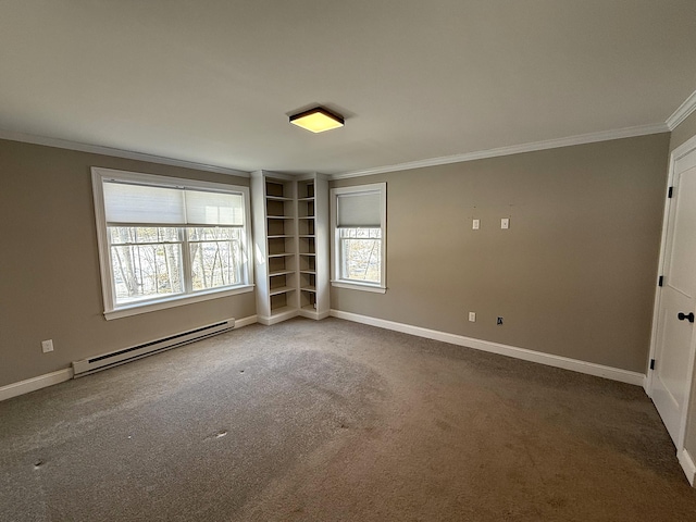 carpeted spare room with a baseboard radiator, ornamental molding, and baseboards