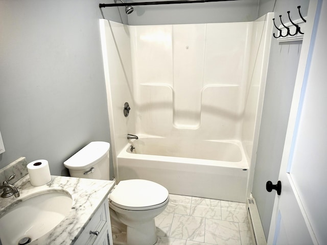 bathroom featuring toilet, marble finish floor, vanity, a baseboard heating unit, and shower / bathing tub combination