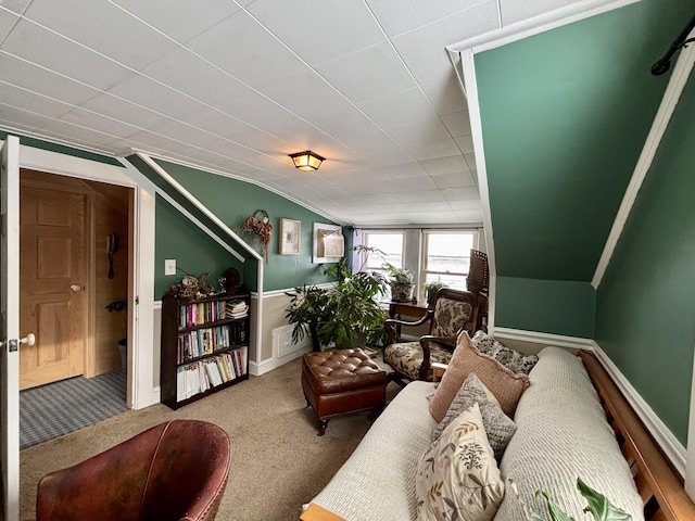 living room featuring vaulted ceiling and carpet floors