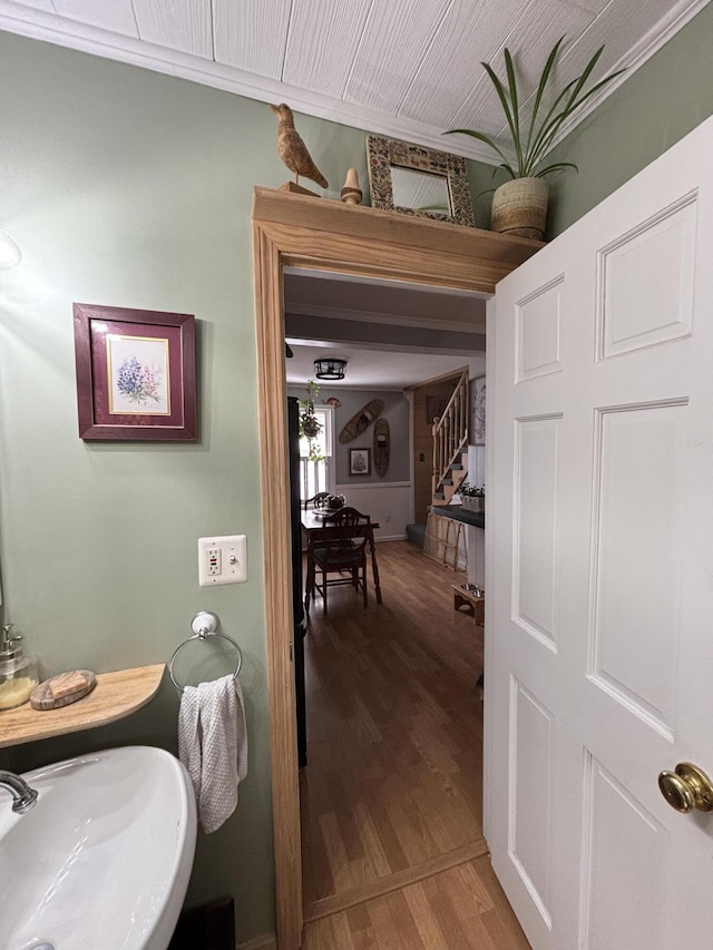 bathroom featuring hardwood / wood-style flooring and sink