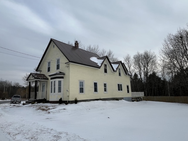 view of snow covered property