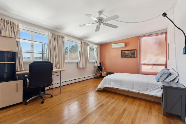 bedroom with lofted ceiling, light wood-type flooring, an AC wall unit, a baseboard radiator, and ceiling fan