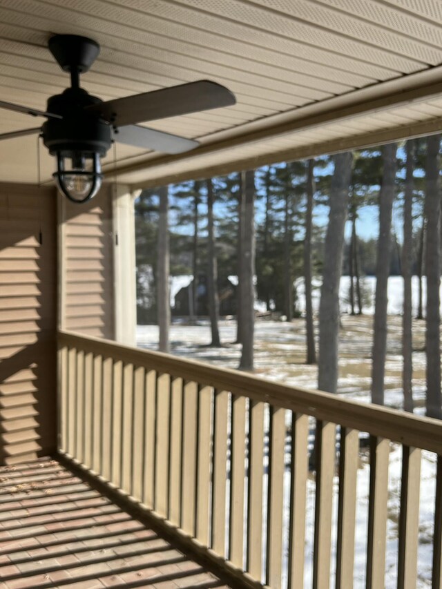 snow covered deck with ceiling fan