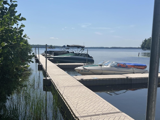 view of dock with a water view