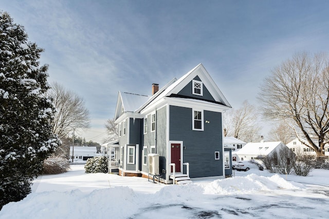 view of snow covered property