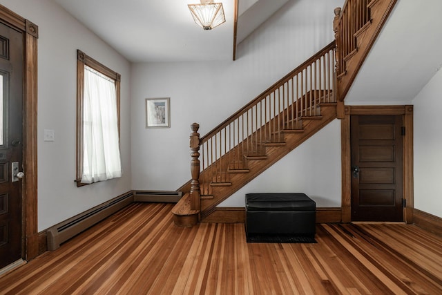 foyer with hardwood / wood-style flooring