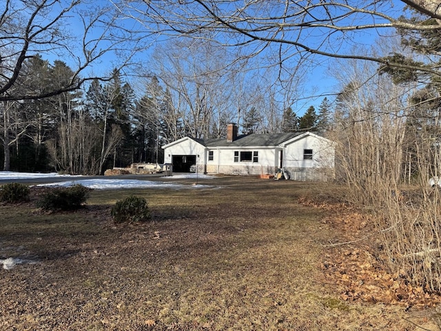 view of yard with a garage