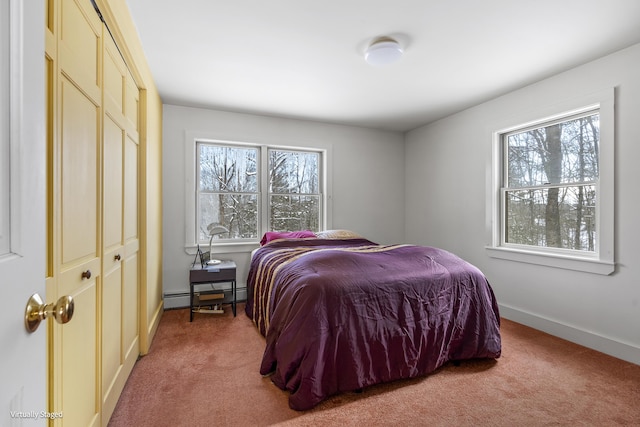 16 Hanna Ln, Bristol, ME 04539 - bedroom featuring multiple windows, light carpet, and a baseboard radiator