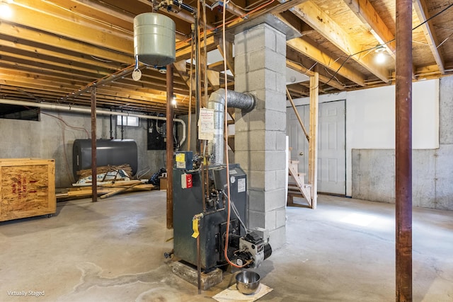 16 Hanna Ln, Bristol, ME 04539 - unfinished basement featuring oil tank and stairs