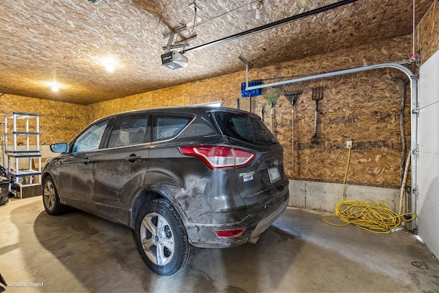 16 Hanna Ln, Bristol, ME 04539 - garage featuring a garage door opener