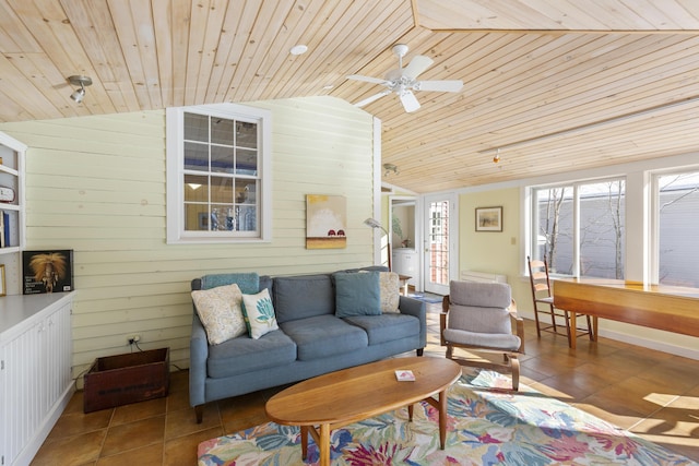 living room with wood ceiling, wooden walls, vaulted ceiling, and tile patterned flooring