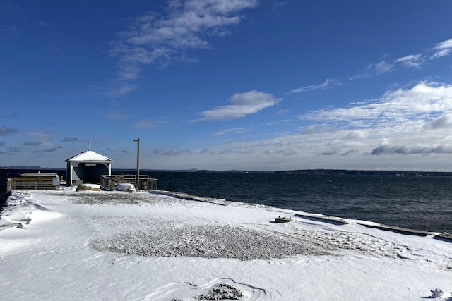 view of yard featuring a gazebo and a water view