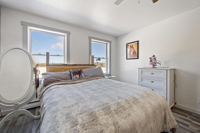 bedroom featuring ceiling fan and hardwood / wood-style floors