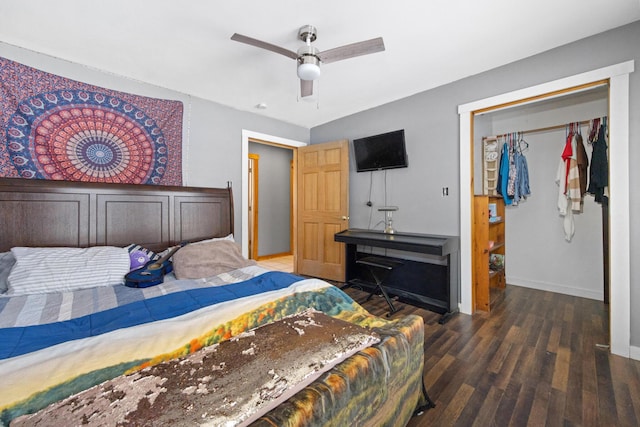 bedroom featuring ceiling fan and dark hardwood / wood-style floors