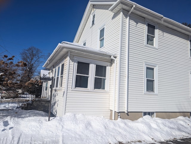 view of snow covered property