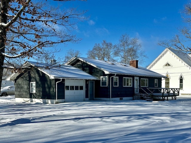 single story home featuring a garage