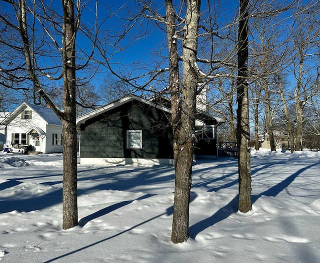 view of snow covered property