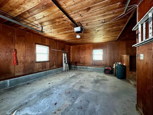 interior space featuring a wealth of natural light and wooden ceiling