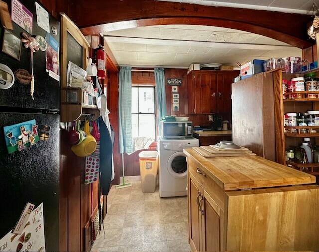 kitchen featuring washer / clothes dryer