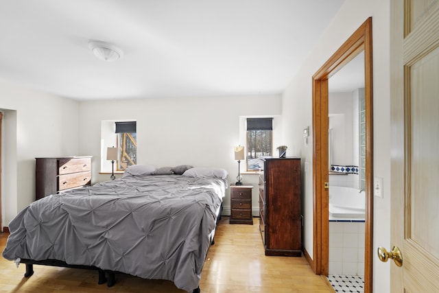 bedroom featuring light wood-type flooring