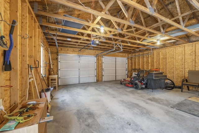 garage featuring a garage door opener