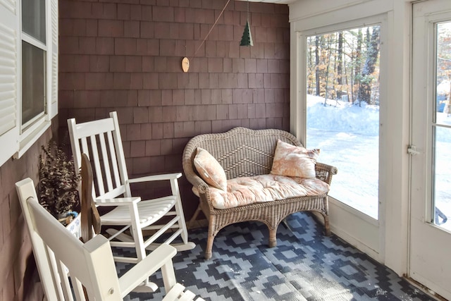 sunroom featuring a healthy amount of sunlight