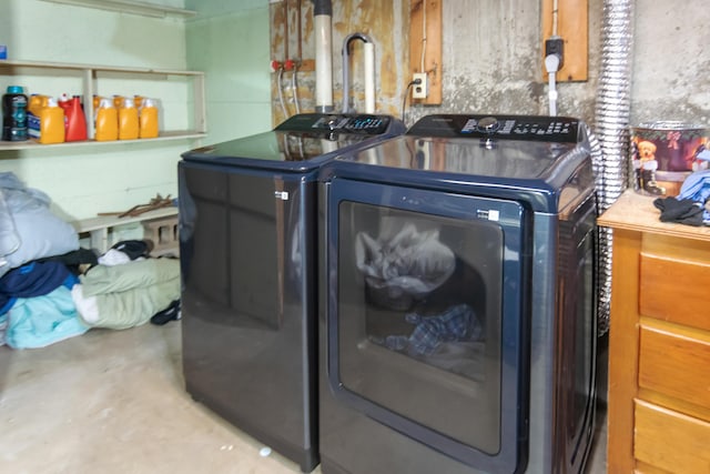 laundry room featuring washing machine and dryer