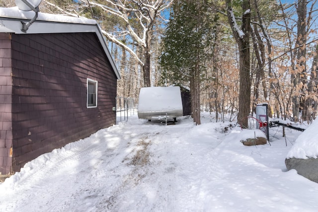 view of yard layered in snow