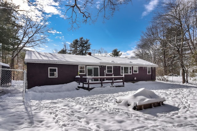 view of snow covered house