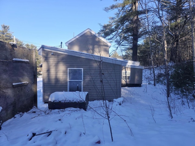 view of snow covered property