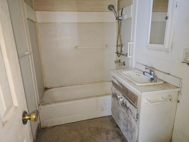 bathroom featuring tile patterned flooring and vanity