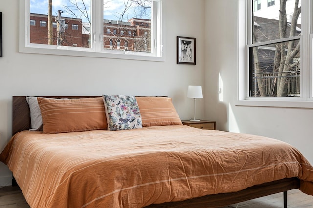 bedroom featuring wood finished floors