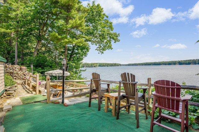 view of patio featuring a water view