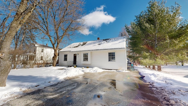 view of snow covered house