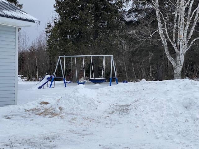 view of snow covered playground