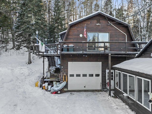 view of front facade featuring a wooden deck