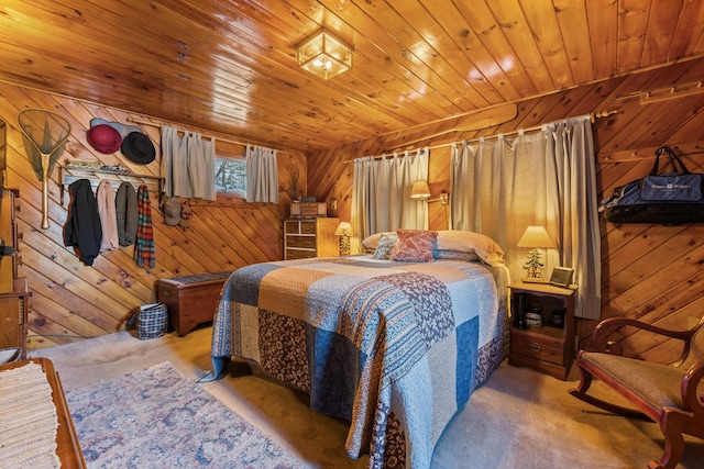 carpeted bedroom featuring wood ceiling and wooden walls