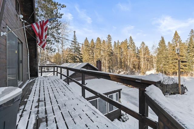 view of snow covered deck