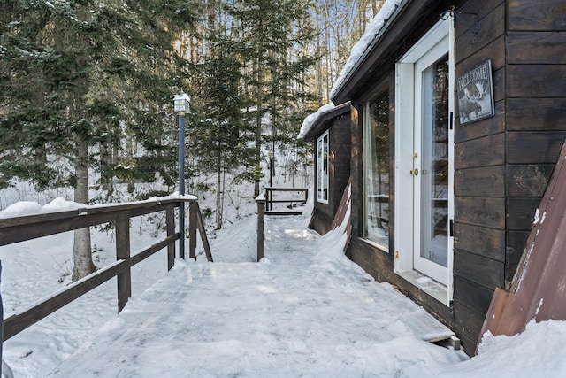 view of snow covered deck