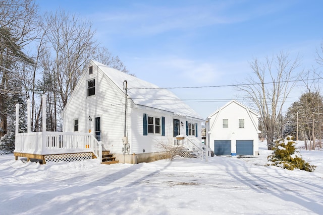 exterior space featuring a garage and a deck