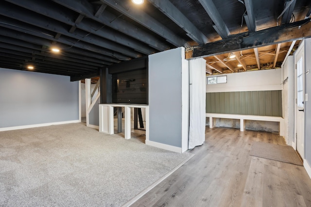 basement featuring hardwood / wood-style flooring