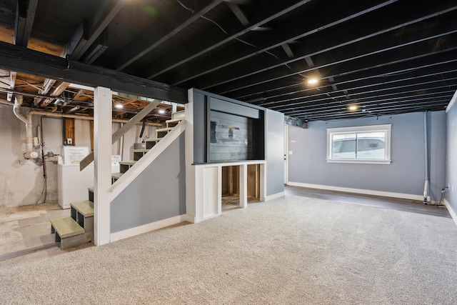 basement featuring carpet flooring