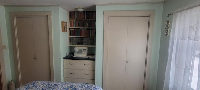 bedroom featuring crown molding