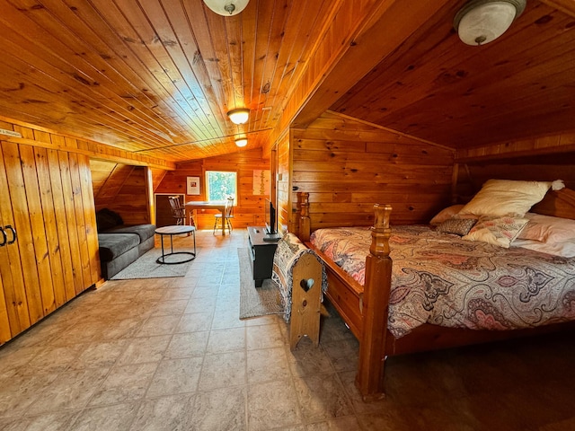 bedroom featuring lofted ceiling, wooden ceiling, and wood walls