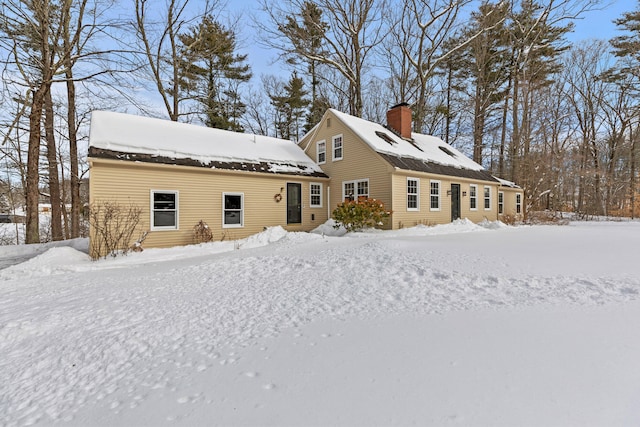 view of front of house with a chimney