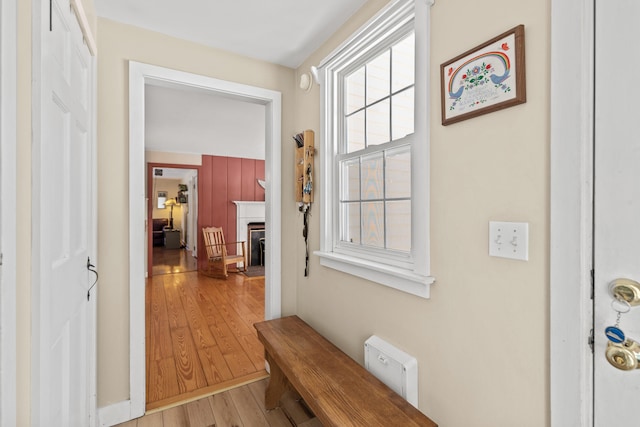 hallway featuring light wood finished floors