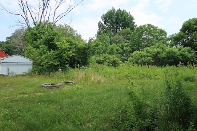 106 Eugley Hill Rd, Nobleboro, ME 04555 - view of yard with an outdoor fire pit