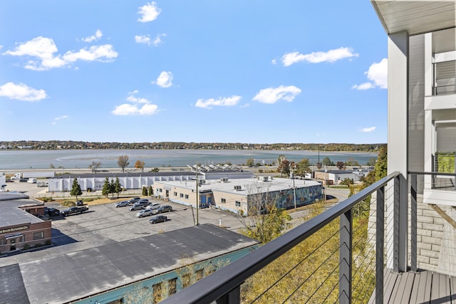 balcony featuring a water view