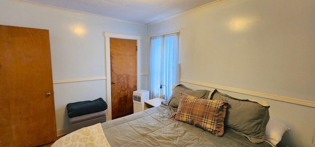 bedroom featuring ornamental molding