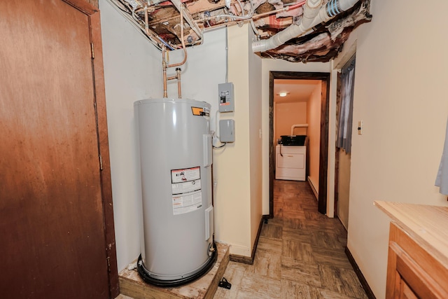 utility room with washer / clothes dryer and electric water heater